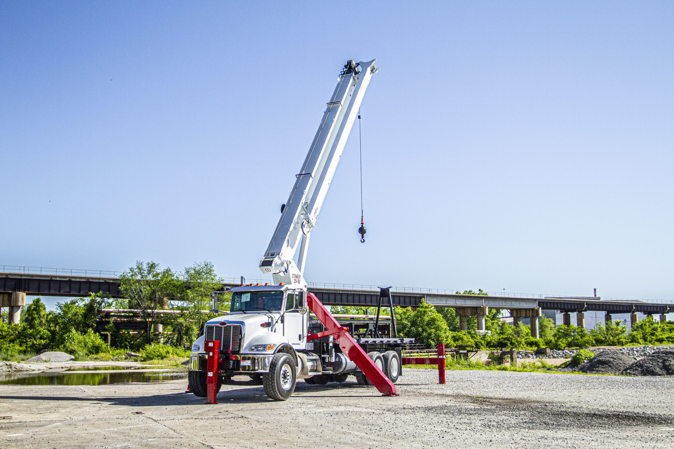 Load King Stinger 25-92 boom truck, serviceable at authorized service centers